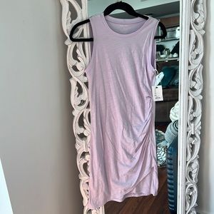 Mine west brand new bodycon dress with criss cross bottom